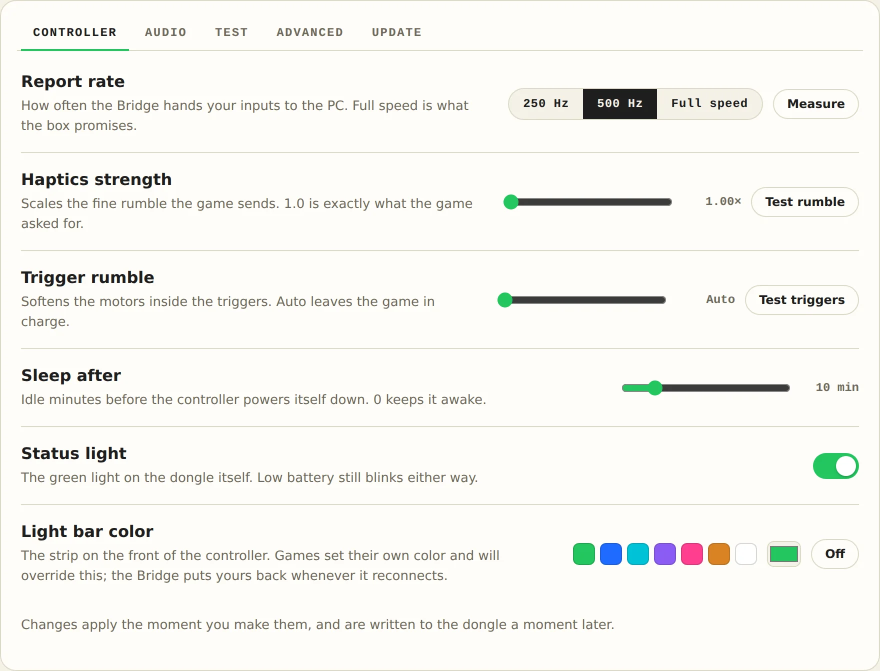 The Blipfrog Adapter control panel: tabs for Controller, Audio, Test, Advanced and Update, with a report rate switch, haptics and trigger sliders, a status light toggle and light bar color swatches.